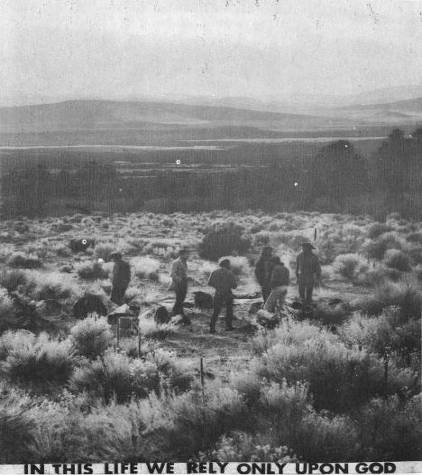 photo of people standing on an open range