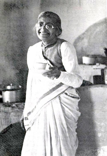 Photo of Mansari holding a cup of tea