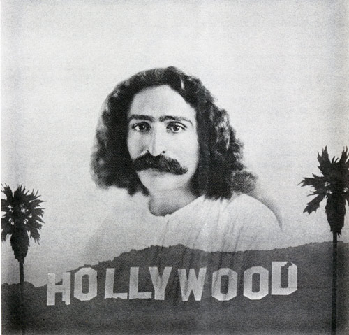 photo of Meher Baba with Hollywood sign imposed under Him